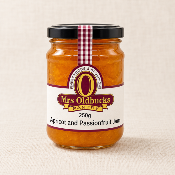 Mrs Oldbucks Pantry Apricot and Passionfruit Jam 250g glass jar on a warm beige linen background