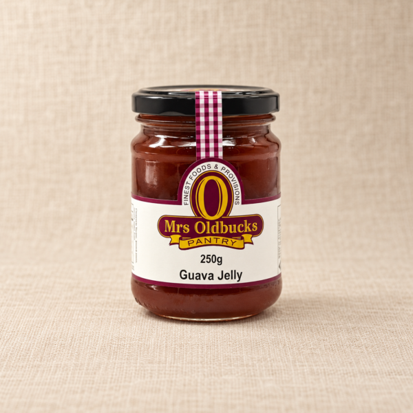 Mrs Oldbucks Pantry Guava Jelly 250g jar on a warm beige linen background
