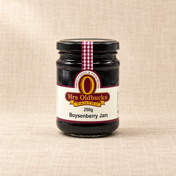 Mrs Oldbucks Pantry Boysenberry Jam 250g jar on a warm beige linen background