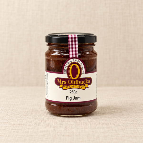 Mrs Oldbucks Pantry Fig Jam 250g jar on a warm beige linen background