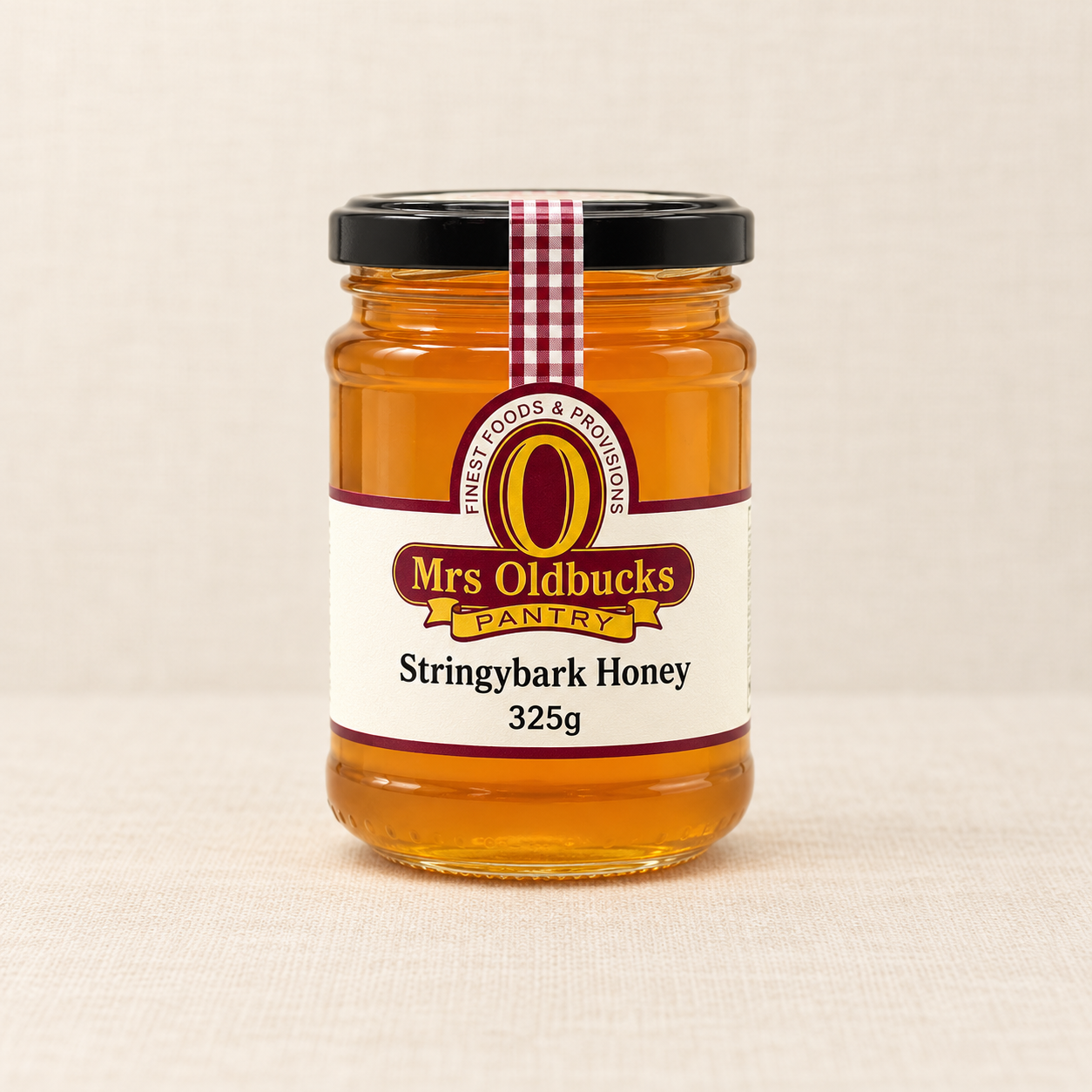 Mrs Oldbucks Pantry Stringybark Honey 325g glass jar filled with mid-amber Australian honey