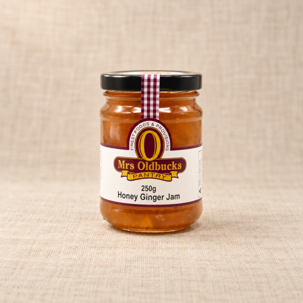 Mrs Oldbucks Pantry Honey Ginger Jam 250g jar on a warm beige linen background