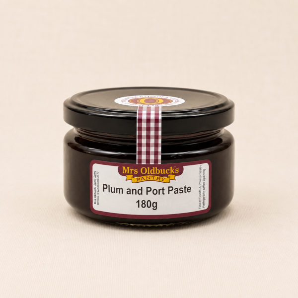 Mrs Oldbucks Pantry Plum & Port Paste 180g in a glass jar on a soft linen background. Rich gourmet fruit paste for cheese boards, crackers and entertaining