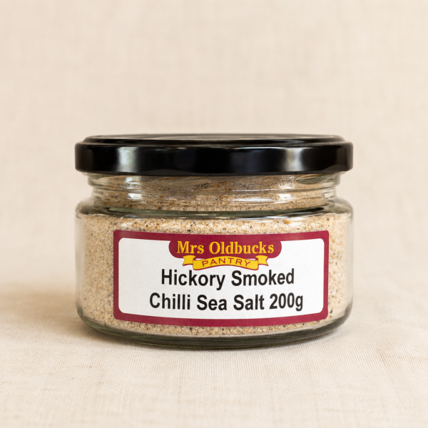 Mrs Oldbucks Pantry Hickory Smoked Chilli Sea Salt 200g jar on a warm linen background