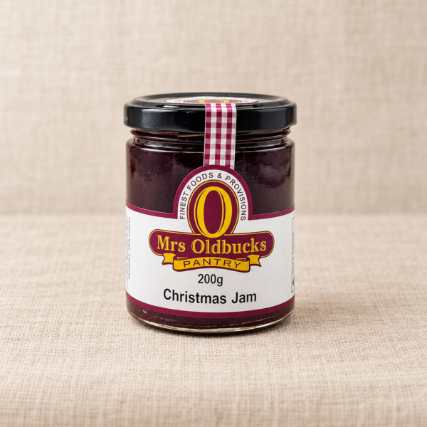 Mrs Oldbucks Pantry Christmas Jam 200g jar on a warm beige linen background