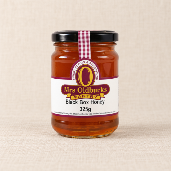 Mrs Oldbucks Pantry Black Box Honey 325g jar on a warm linen background