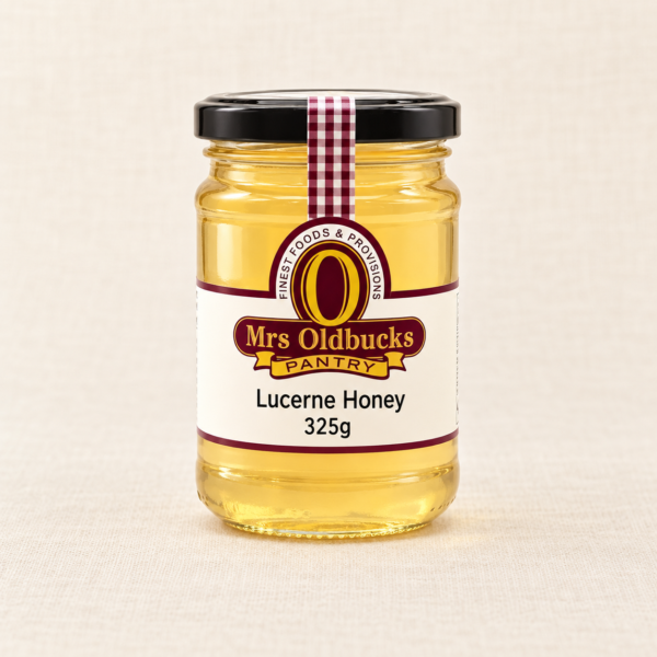 Mrs Oldbucks Pantry Lucerne Honey 325g jar on a warm linen background