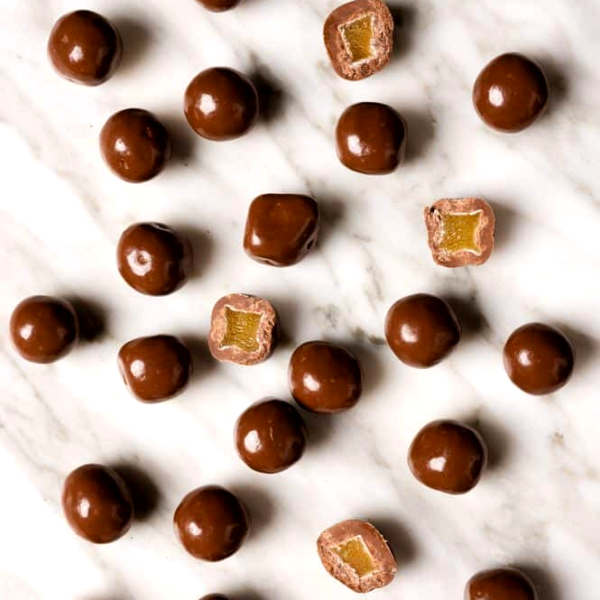 Milk Chocolate Ginger Mrs Oldbucks Pantry .BerrimaMilk chocolate coated ginger pieces with soft ginger centres from Mrs Oldbucks Pantry in Berrima.
