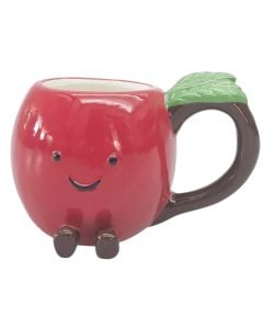 Mrs Oldbucks Pantry Annie Apple Mug Red apple-shaped ceramic mug with smiling face, green leaf handle detail and small brown feet on a white background.