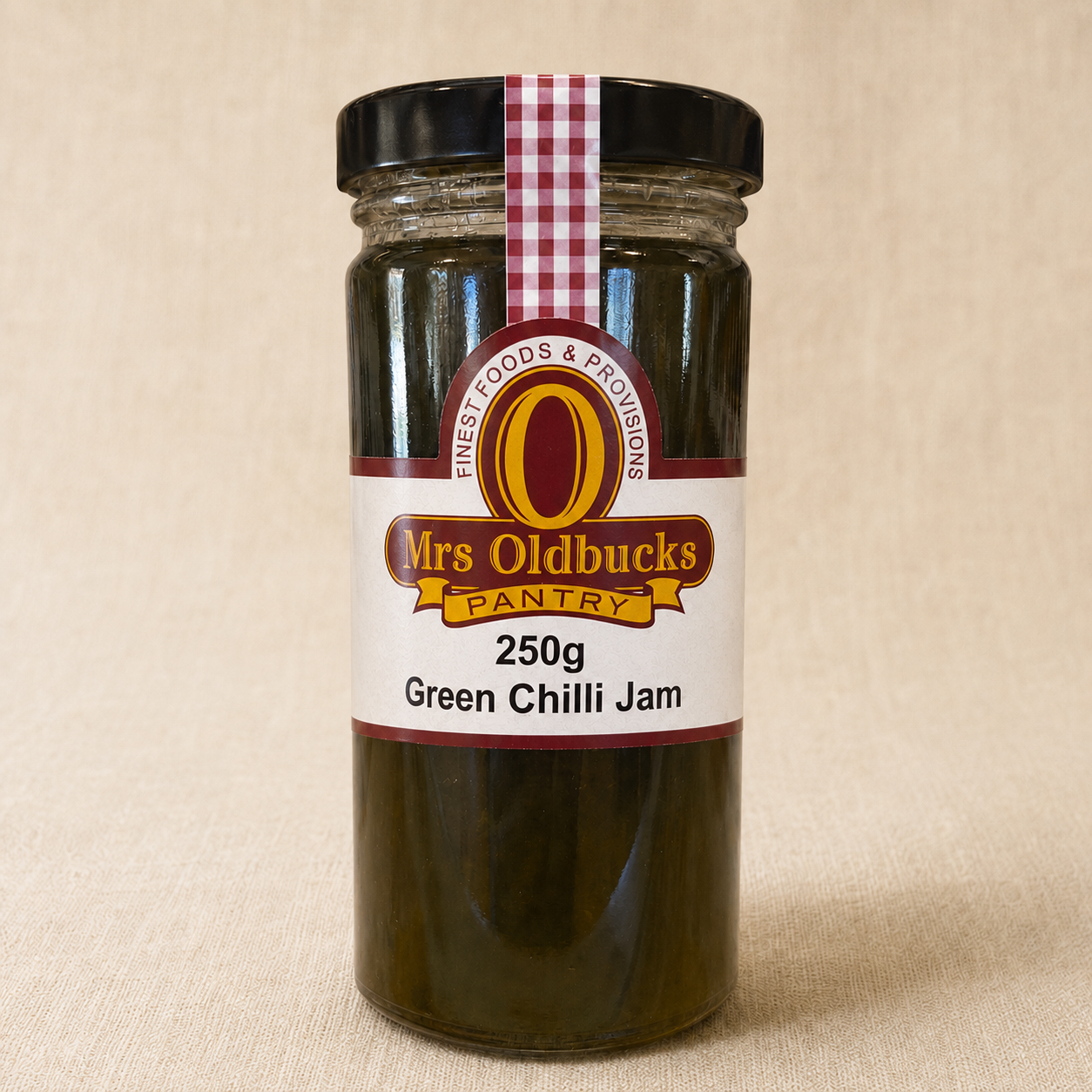 Mrs Oldbucks Pantry 250g Green Chilli Jam jar on a soft linen-coloured background