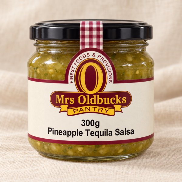 Mrs Oldbucks Pantry Pineapple Tequila Salsa 300g jar on a light linen background
