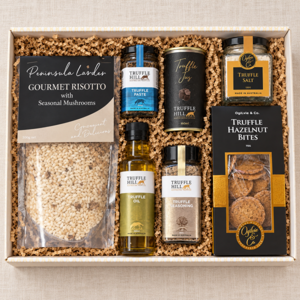 Truffle Lover’s Hamper with mushroom risotto, truffle paste, jus, oil, seasoning, salt and hazelnut bites in a cream gift box.